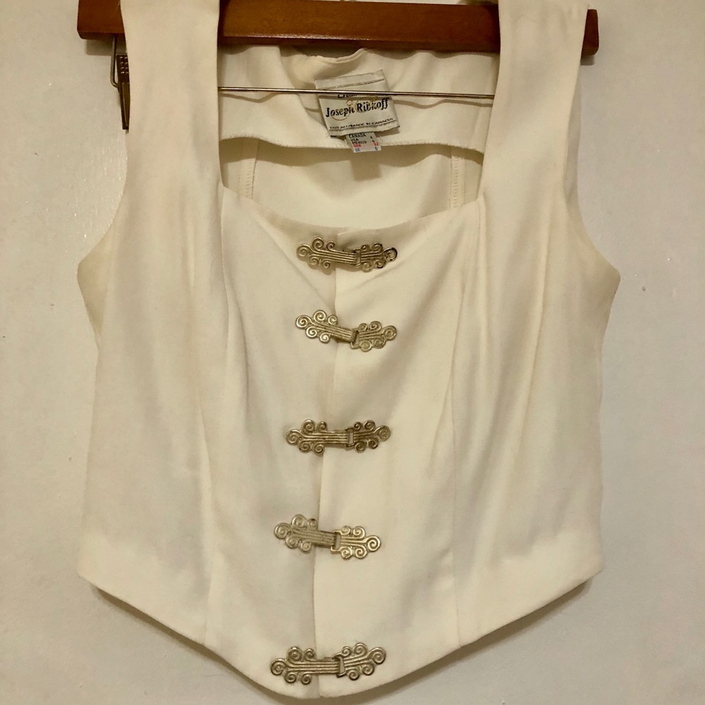 Vintage blouse with ornate metal hooks